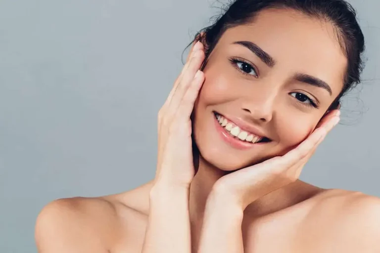 Woman with clear, healthy skin after successful natural acne treatment